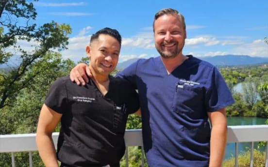 Dr. Francisco Suarez and Dr. Shaun Burlingame on the office deck above the Sacramento River
