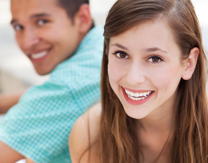 Smiling patient after wisdom tooth removal